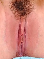 A teenager undressing completely