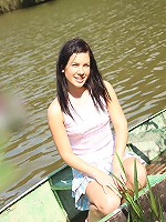 Hot naked chick posing on a boat