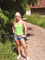 Chick masturbating in the garden