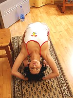 Brunette teen gymnast toys pussy