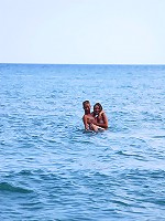 Two cute teen girls on the beach