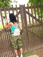 Two young girls toying their slit