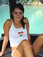 Teen spreading slit in a backyard