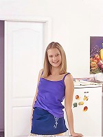 Cute blonde teenage girl spreads