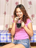 Cute brunette teen spreading legs