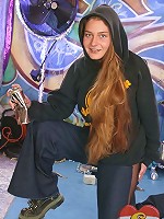 Teenie girl stripping in an alley