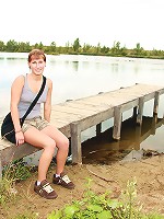 Teen near a lake pleasures cooch