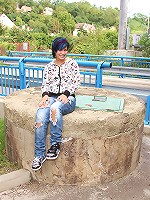 Teenage babe with blue hair plays