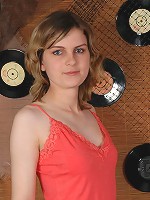 Teenage brunette showing her tits