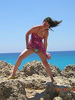 Teenage brunette showing her body