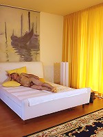 Maid cleans a senior cock orally