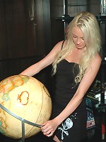 Hot little Kelly showing off her assets in a tight black dress.