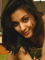 Girl gets naked and plays with her pussy in the kitchen