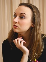 Brunette teen Rihanna posing naked in front of a mirror