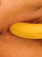 Horny teen girl Lori fills her wet pussy with a banana fruit
