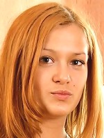 Horny teen babe Laura pounds her anus with a carrot