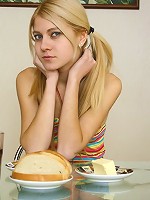 Skinny teen Stacey masturbates on the glass table