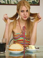 Skinny teen Stacey masturbates on the glass table