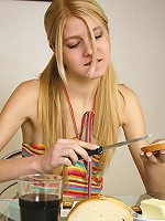 Skinny teen Stacey masturbates on the glass table