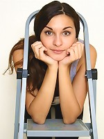 Sexy teen strips out and masturbates her wet pussy