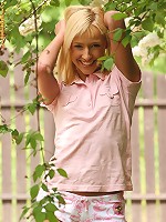 Flirty teen cutie strips by fence