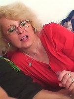 The grandmother and the young man make passionate love until they're interrupted