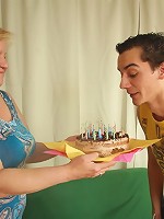 Hot grandma licks whipped cream off his young cock and lets him do her ancient pussy