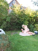 He lays down a blanket and the two of them fuck outdoors for a wonderfully lusty time