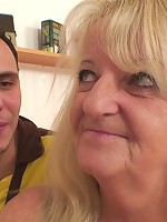 The mature blonde makes a call from his place and her big ass looks damn fine in the scene