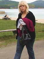 She and her young lover are outdoors and the sexy mature is fucked in her dripping wet pussy