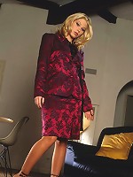 Young blonde girl in pantyhouse and high heals