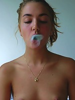 A naked girl and a little chewing gum strut their stuff for the camera.