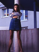 Young woman shows off what\'s underneath her skirt.  Sexy and strong!