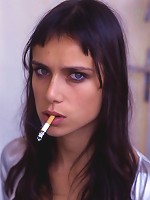 Young woman shows off what\'s underneath her skirt.  Sexy and strong!