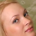 Sweet blonde teen takes a bath