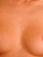 Sweet teen strips in her kitchen