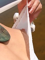 Horny blonde teen spreads her wet pussy