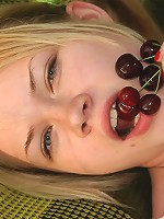 Sexy blonde plays with dildo outdoors