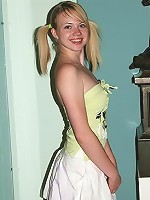 Cute blonde shows off her tiny panties