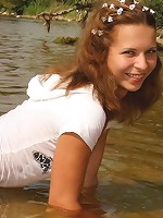 Teen plays naked in the river