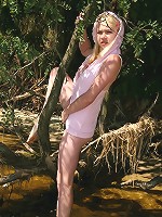 Horny blonde teen plays with dildo outdoors