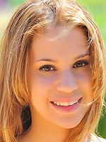 Maya enjoys the sun outside