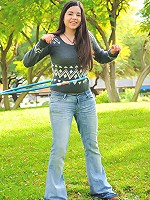 Nadine hula hoops naked outside