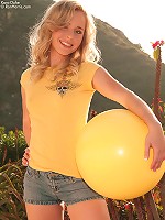 Sassy Kara playing in the garden with her ball gets naughty and strips naked