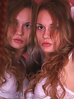 Sexy teen Evelina posing in the lace white stockings and gloves