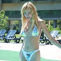 Beautiful blonde Zina taking off her swimsuit