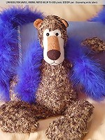 Esenia plays with her feather boa