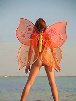 Hot stunning girl posing naked with butterfly wings