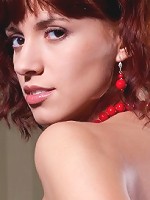 Busty brunette showing her big nipples and shaved tight pussy