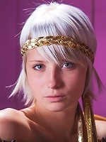 Brave goddess blonde is reading her favorite book on the chair indoors